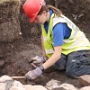 Ruth excavating the drainage channel in the south west corner