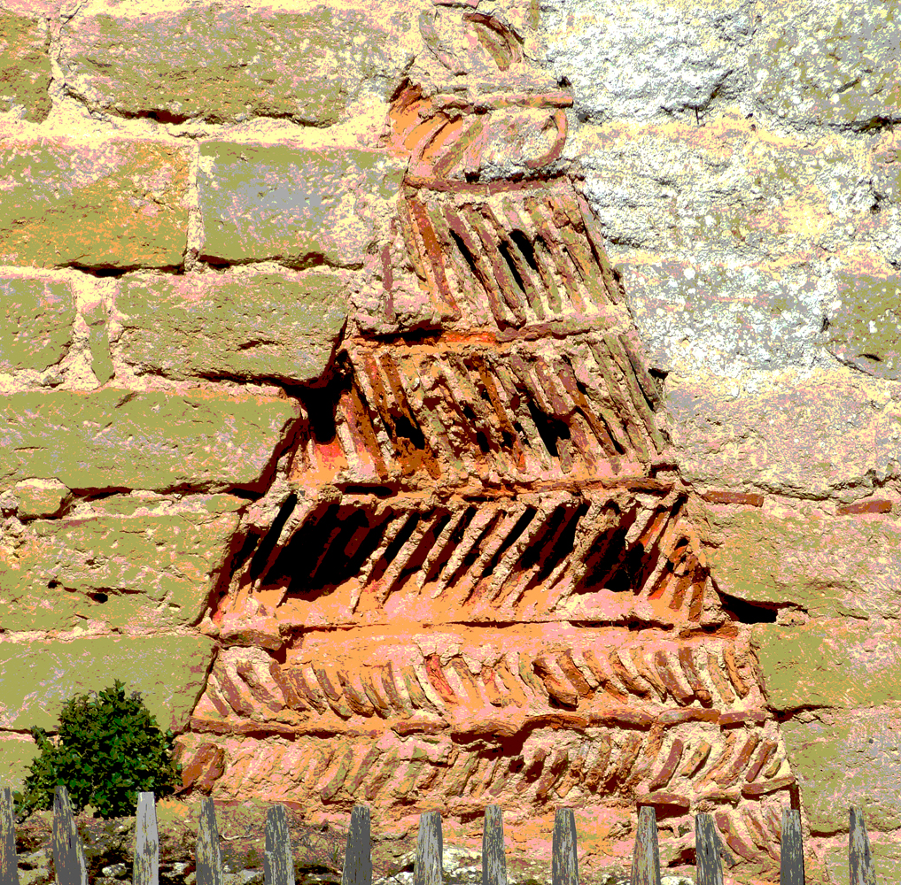 A pattern of brickes behind a hearth